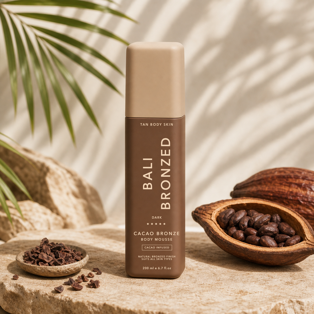 Cacao bronze body mousse bottle with cacao pods and nibs